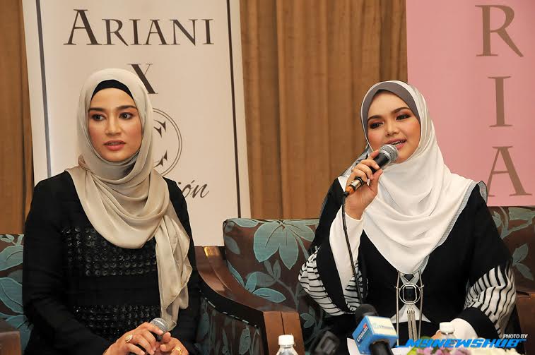 Datuk Siti Nurhaliza bersama Pengarah Pemasaran Ariani Textiles, Datin Farah Haryani Muhamad Philip. 