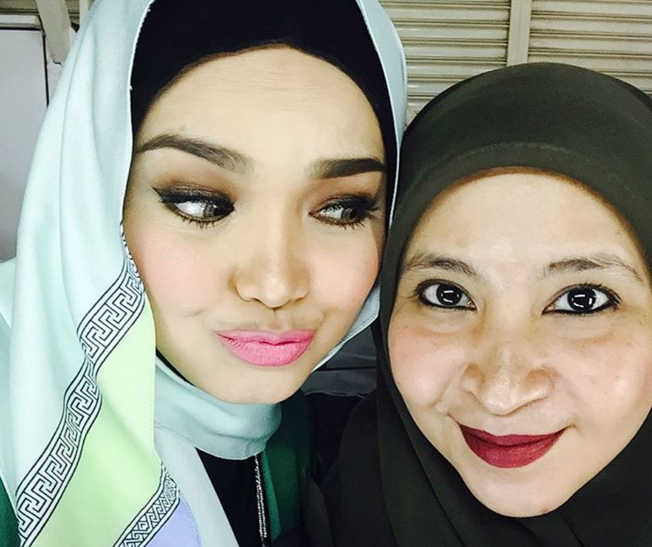 siti nurhaliza dan pengurus, Rozi